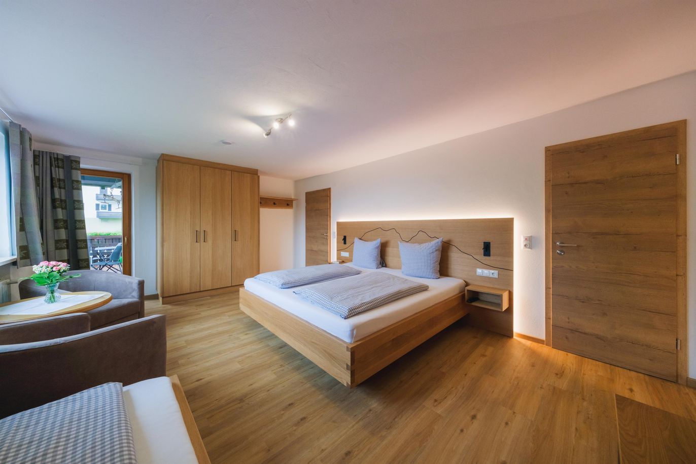 Schlafzimmer - Ferienwohnung Flieder