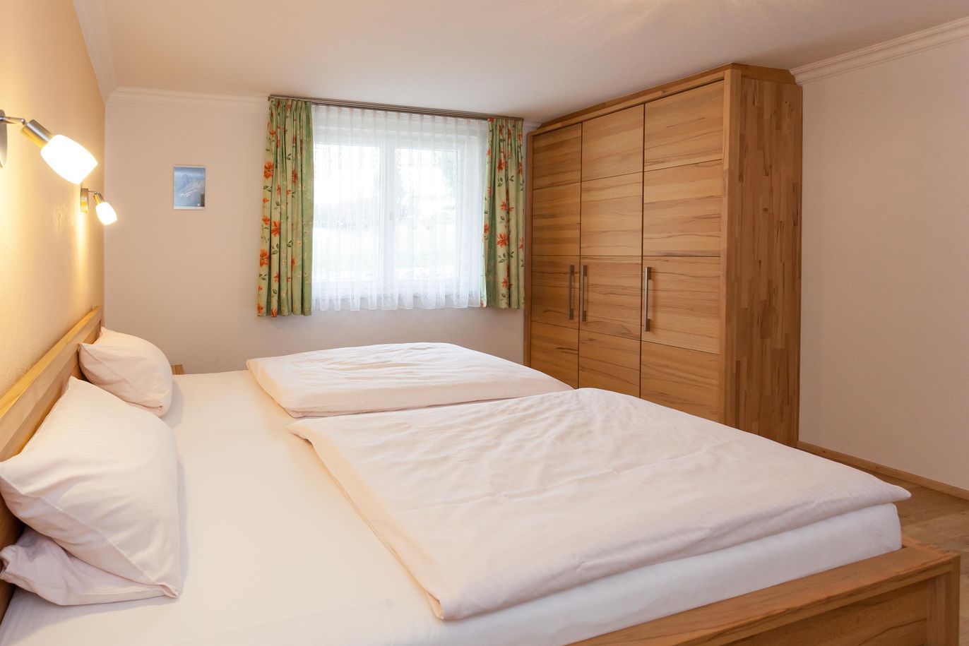 Schlafzimmer - Ferienwohnung Blumenwiese