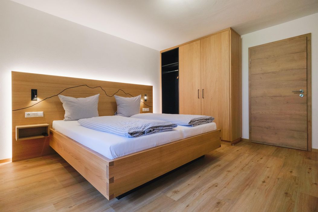 Schlafzimmer - Ferienwohnung Flieder