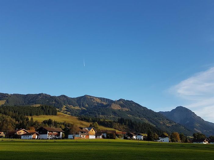 Hinang im Hintergrund die Sonnenköpfe und Rubihorn