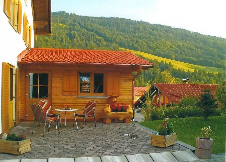 Gartenhaus mit Grillplatz