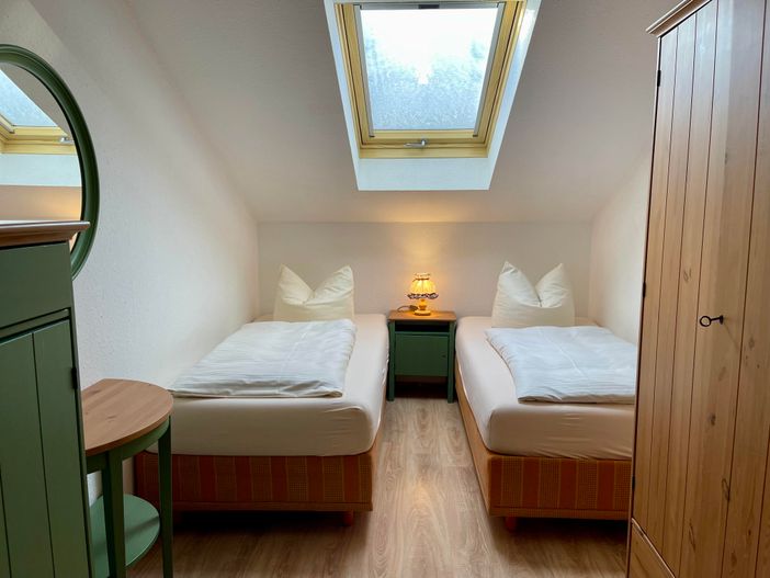 Schlafzimmer mit Einzelbetten