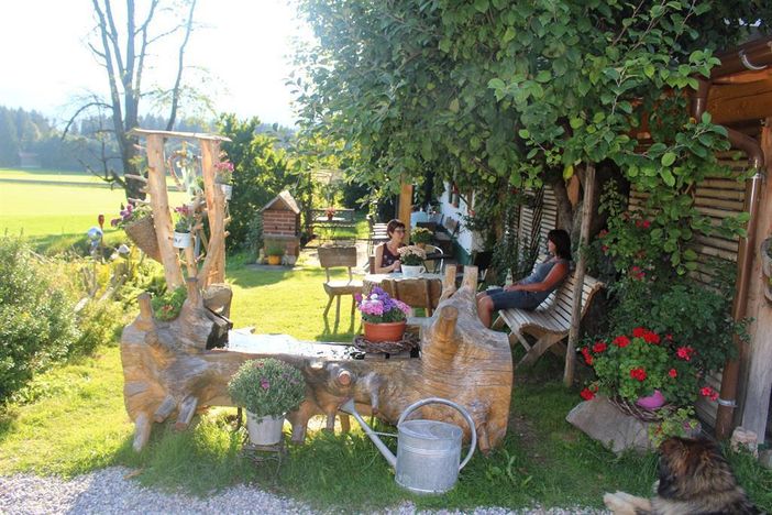 Jill and guest Andrea relaxing in the garden.