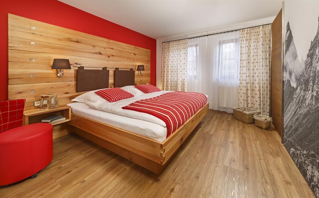 Ferienwohnungen Alpenchalet / Wohnung Almrausch