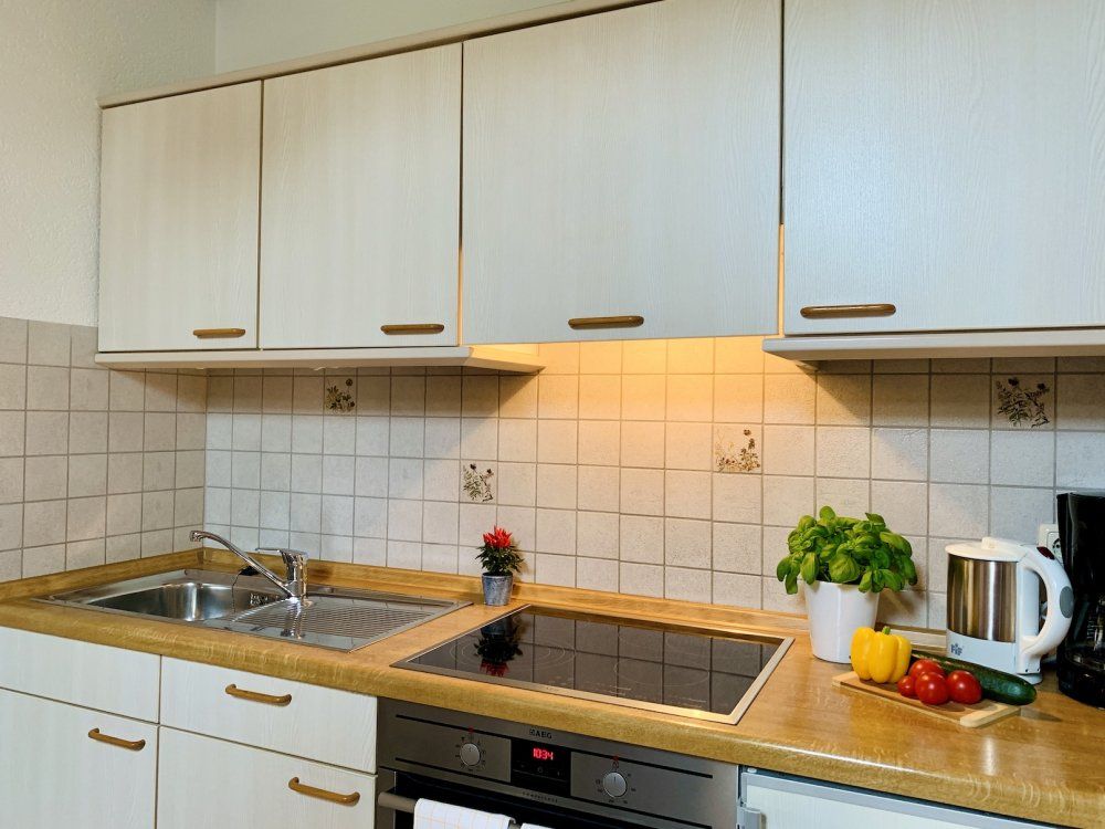 Die vollausgestattete Küche in Wohnung 4