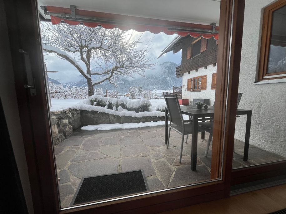 Blick aus dem Bett in den Garten