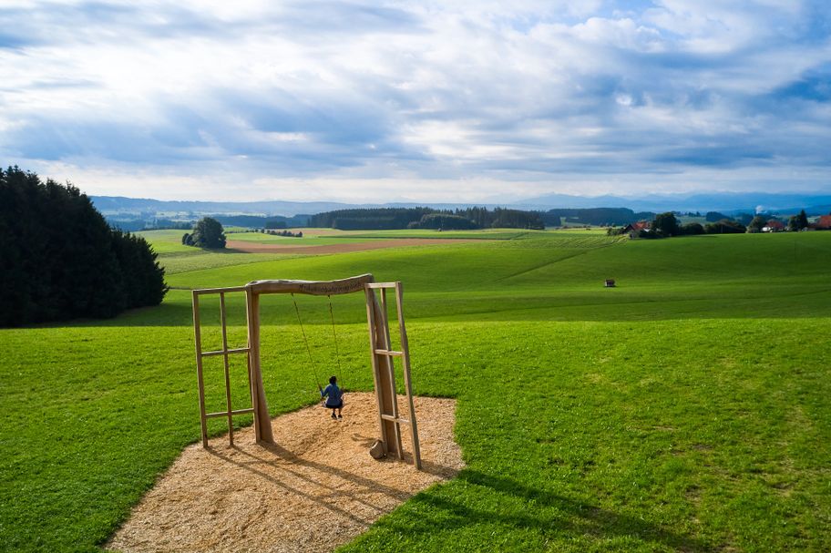 Blick in die Weite, schaukelnd erleben, Glücksmomente-Runde