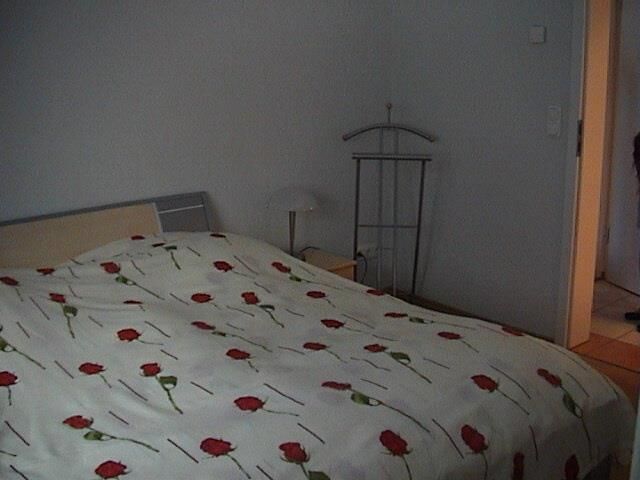 Schlafzimmer mit Doppelbett